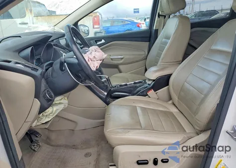 2014 Ford Escape Titanium z USA, uszkodzony, nr VIN 1FMCU9J99EUD80311